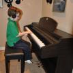 Matthew at the Clavinova in the Computer Lab/Practice Room